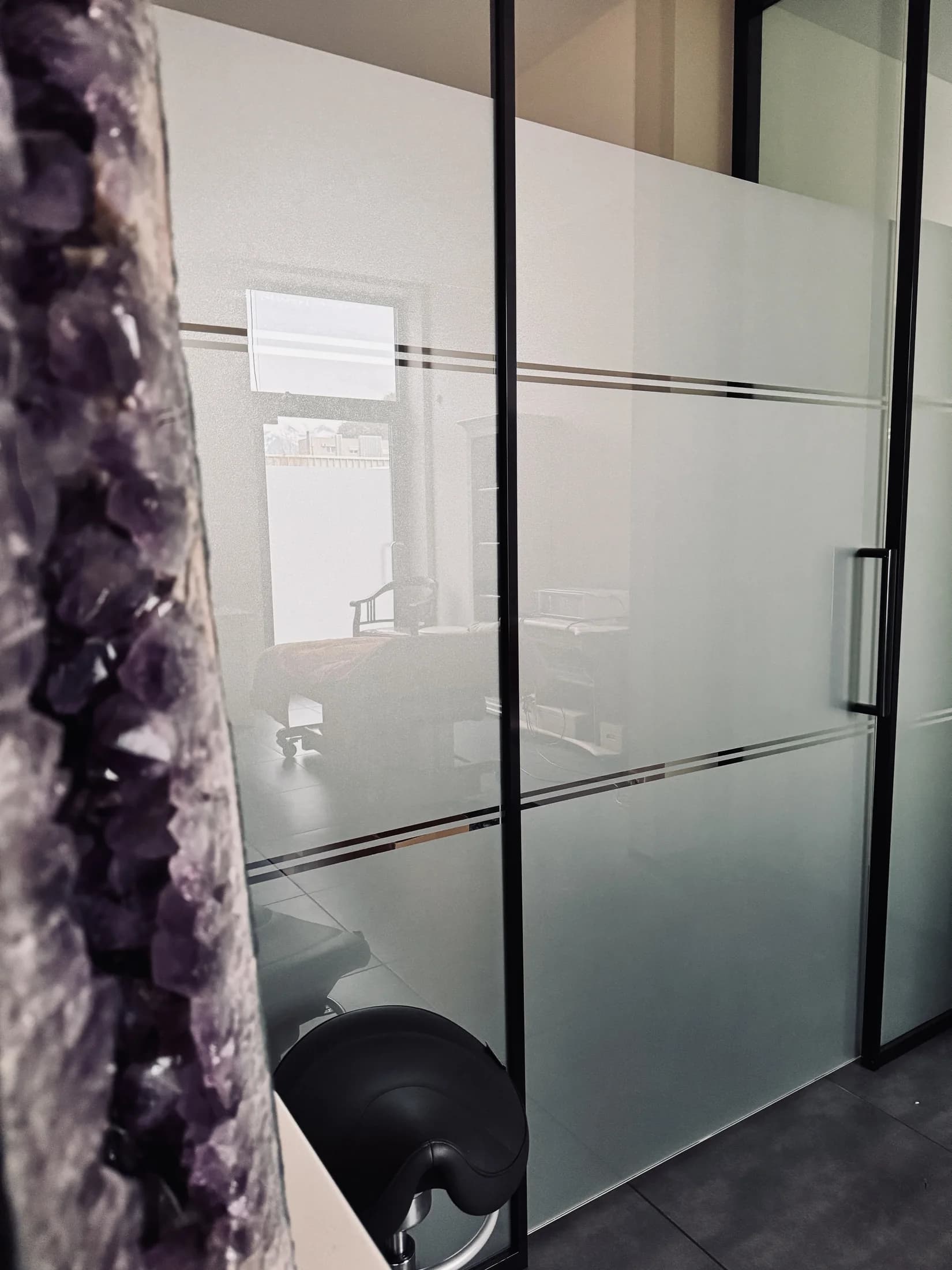 Privacy band across multiple glass panels and a door